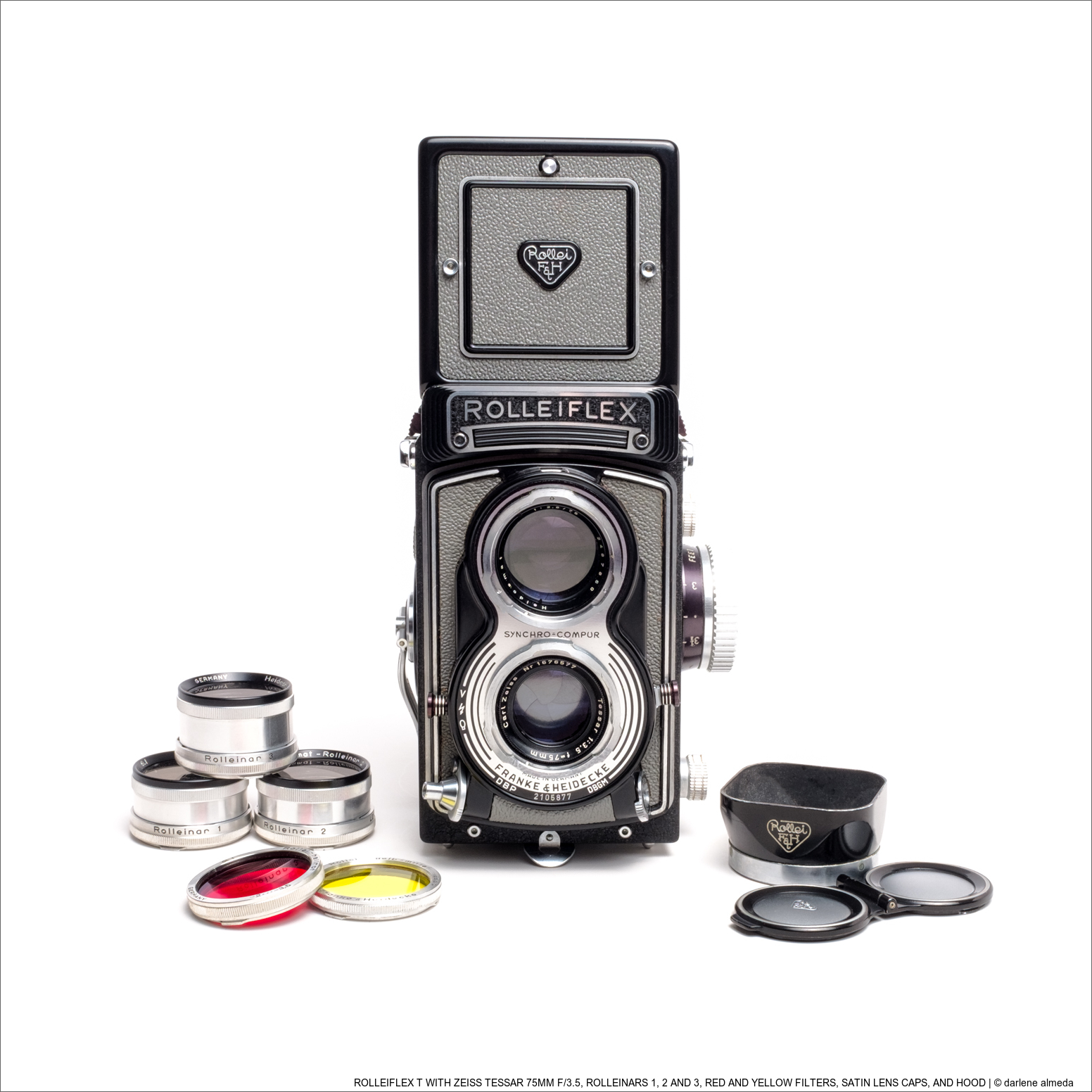 ROLLEIFLEX T WITH ZEISS TESSAR 75MM F/3.5, ROLLEINARS 1, 2 AND 3, RED AND YELLOW FILTERS, SATIN LENS CAPS, AND HOOD